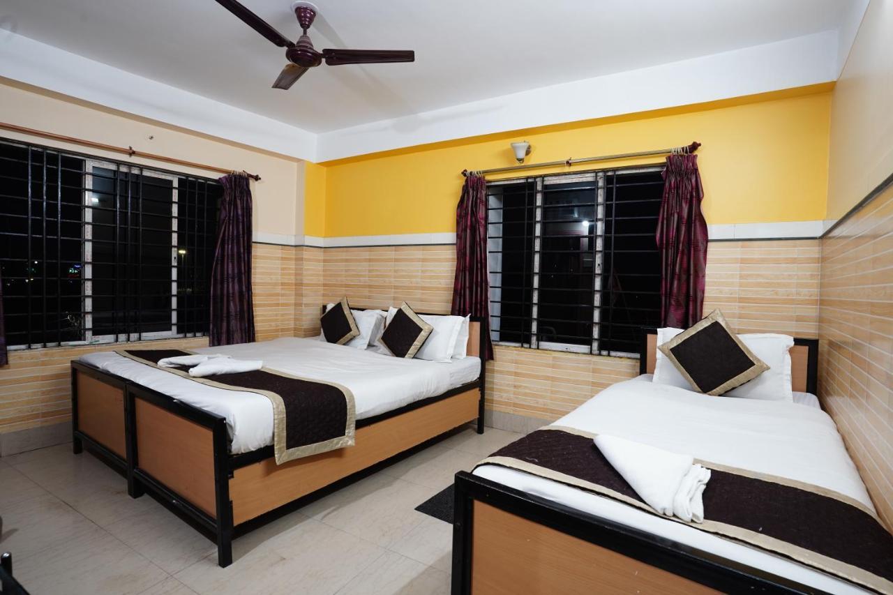 Tirupati Lodge Njp Силигури Екстериор снимка