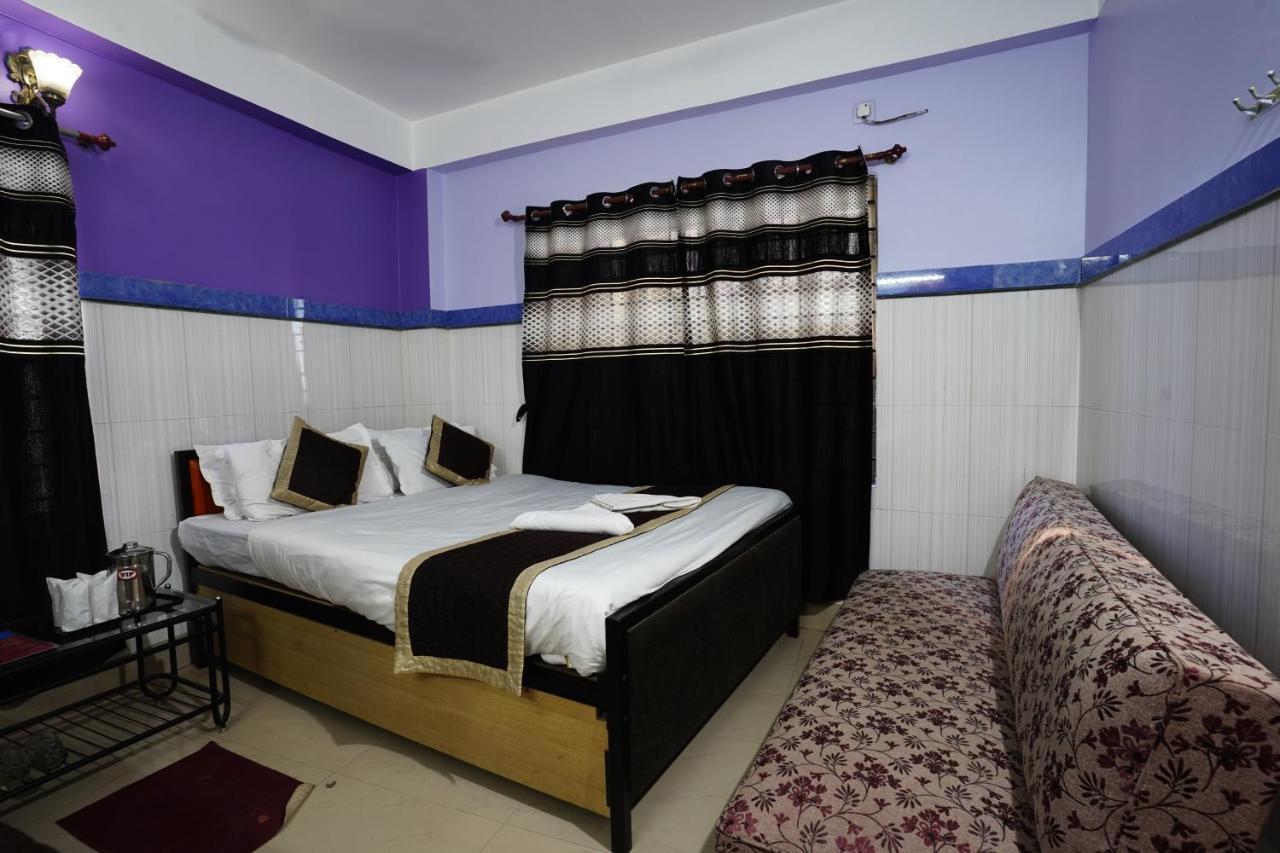 Tirupati Lodge Njp Силигури Екстериор снимка