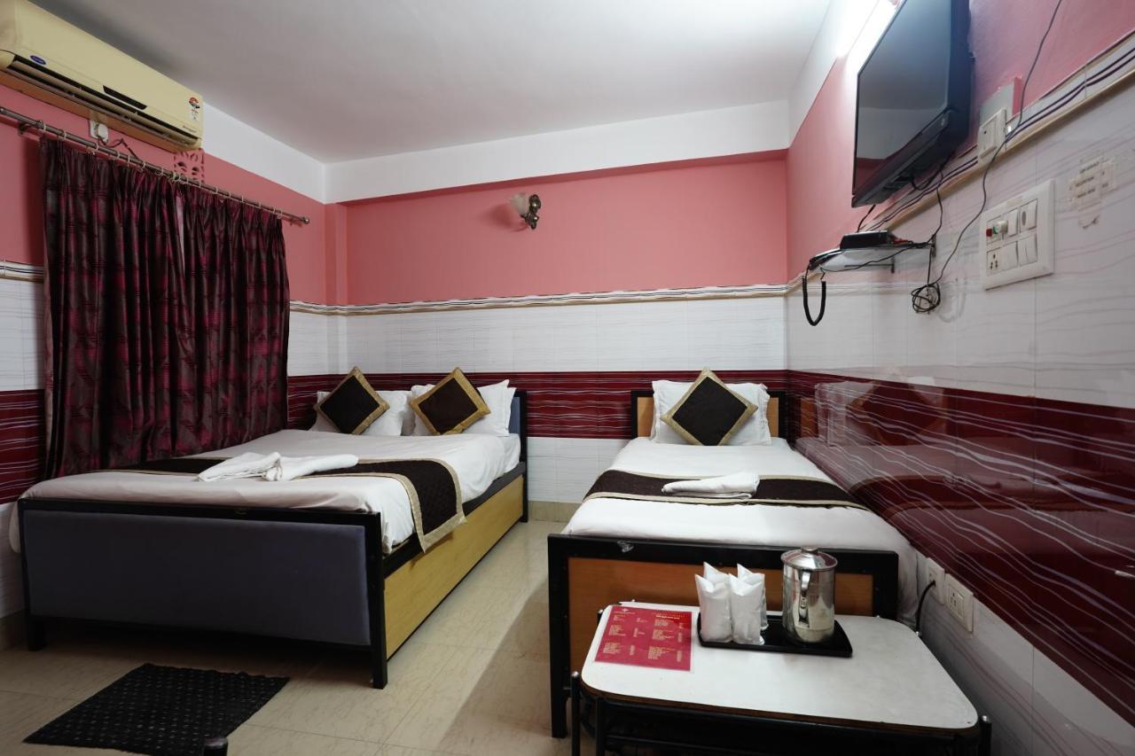 Tirupati Lodge Njp Силигури Екстериор снимка