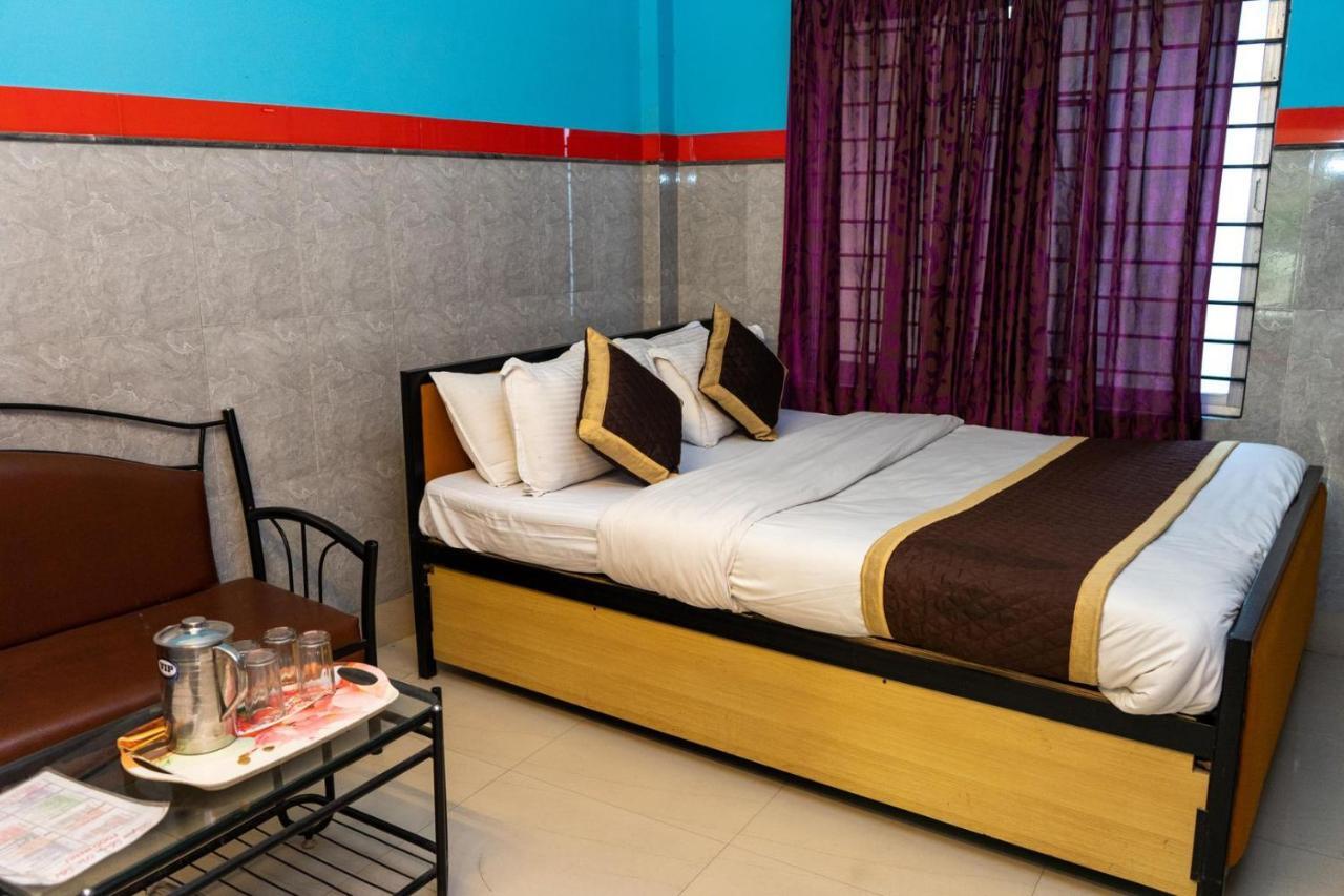Tirupati Lodge Njp Силигури Екстериор снимка