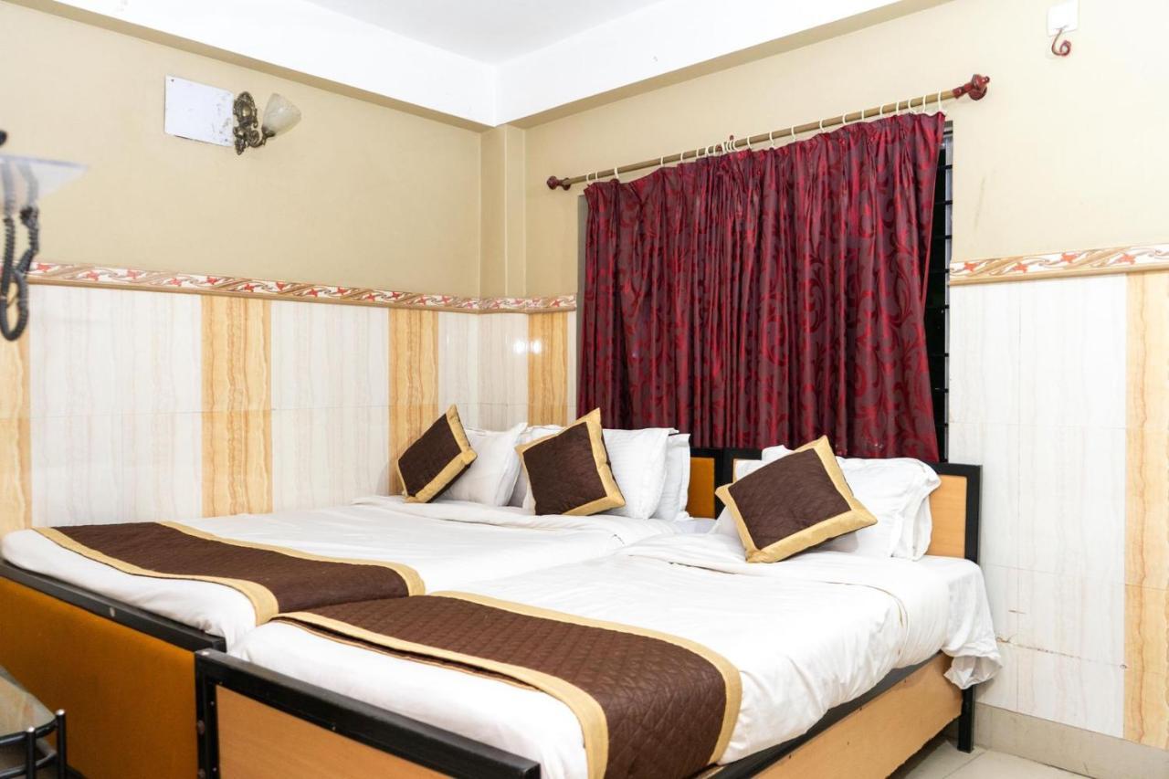Tirupati Lodge Njp Силигури Екстериор снимка